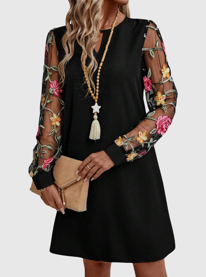 Zuzana | Elegantní šaty s výstřihem do V a výraznými rukávy